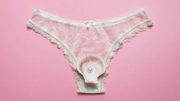 Por que a maioria das calcinhas tem um laço na frente? Não é só estética